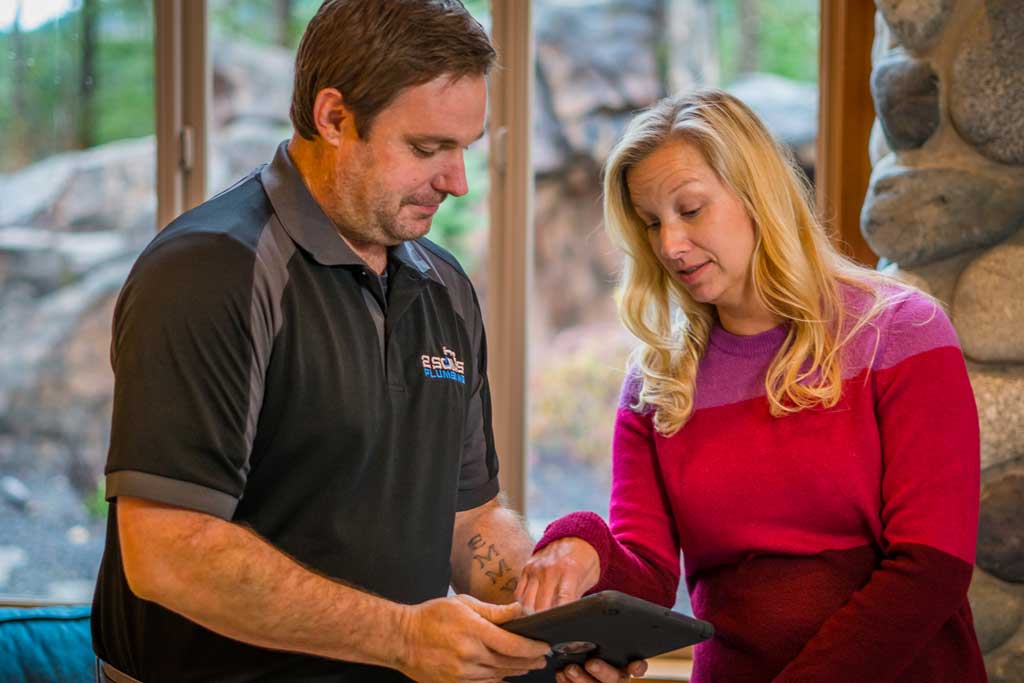 2 Sons technician walking a Seattle homeowner through options