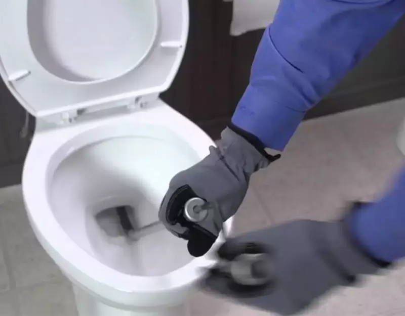 Newly installed toilet in a residential bathroom